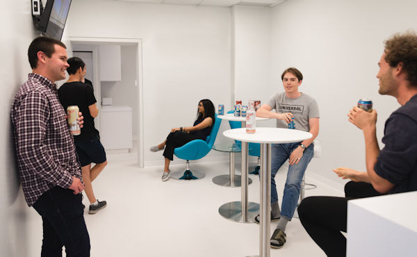 Employees gathered in the new break room for Beer Friday