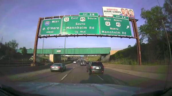 On-vehicle camera in Illinois captures overhead lane signs