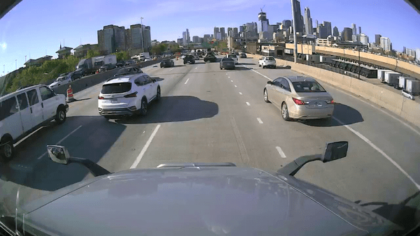 A 1 fps video from one of Vizion’s on-vehicle cameras showing faded paint lines, a damaged impact attenuator drum, and cracked road surfaces