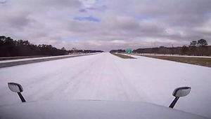 On-vehicle camera in Texas captures snow on road